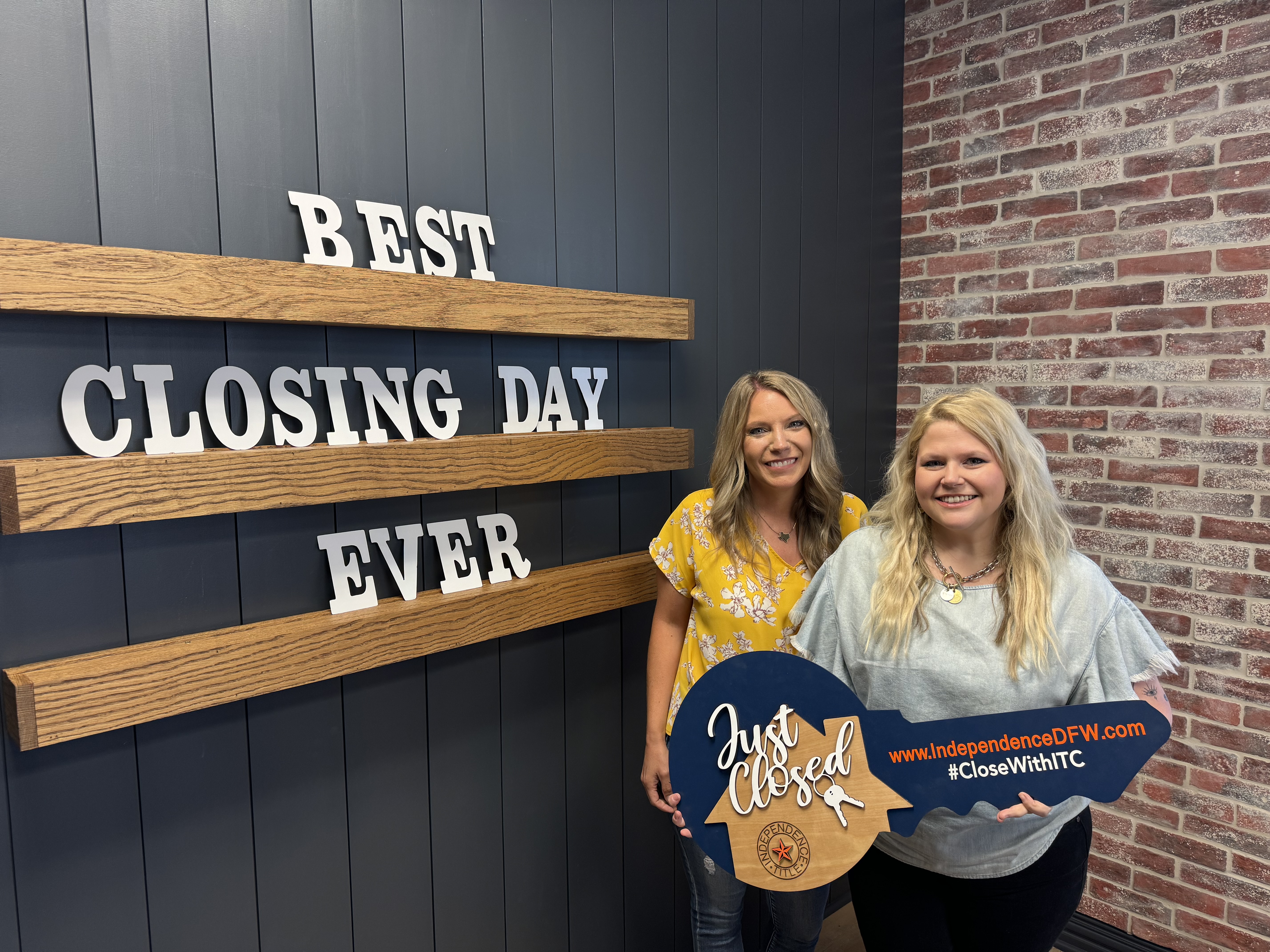 Best Closing Day Ever — Megan Vollmer with a client at closing